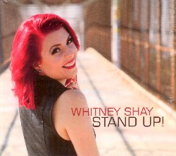 SHAY WHITNEY :  STAND UP!  (RUF)

Stand Up! non  solo il titolo di un disco, ma  anche un'esortazione che porter chiunque ascolti il mix incontenibile di rhythm & blues di Whitney Shay, direttamente sulla pista da ballo! La cantautrice di San Diego, definita dalla prestigiosa rivista Blues Matter Magazine la 'futura icona del blues', presenta un disco che invita a ballare e sognare: 12 canzoni che sono la colonna sonora giusta per i momenti pi alti e quelli pi bassi della vita. Nel suo nuovo progetto registrato nello Wire Record Studio di Austin, insieme al produttore Kaz Kazanoff, Whitney lascia fluire vibrazioni positive e coinvolgenti. Le canzoni sono caratterizzate da una sfacciata combinazione di soul, ritmi avvolgenti ed una voce che sa di fumo e fuoco come si pu ascoltare nel brano che d il titolo all'album e in P.S. It's Not About You. Al suo fianco Whitney ha voluto una band di eccellenti musicisti di cui racconta: Uno dei miei ricordi preferiti  quando con Guy Forsyth abbiamo registrato il duetto Far Apart (Still Close). Nel giro di un'ora cantavamo, sbellicandoci dalle risate. Per i loro brillanti assolo di chitarra nel brano Equal Ground, abbiamo definito Laura Chavez e Derek O'Brien 'Godzilla vs. Mothra' perch entrambi sono due veri mostri di questo strumento! Poi c' Red Young, una leggenda dell'organo che ogni volta riesce ad aggiungere ad ogni pezzo la quantit giusta di soul. Il materiale di Stand Up!, scritto insieme ad Adam J. Eros, riempir le piste di ballo, ma ci porter anche nella testa di Shay, con temi personali e anche socio-politici. Dice l'artista: Sono una donna forte ed indipendente. Visto che sono stata cresciuta da mia madre e mia nonna, molti dei brani di questo disco trattano temi come l'uguaglianza ed il potere delle donne. Che sia dura o piena di dolore, ogni nota di Stand Up!  vera ed arriva immediatamente all'ascoltatore. Le ultime parole spettano all'artista: Quando entro voglio che la gente balli. Per me la musica significa sempre catarsi, scacciare esperienze tristi. Quando il pubblico ritorna a casa con un sorriso e con la sensazione di aver dimenticato le preoccupazioni quotidiane, allora posso dire di aver fatto il mio lavoro.